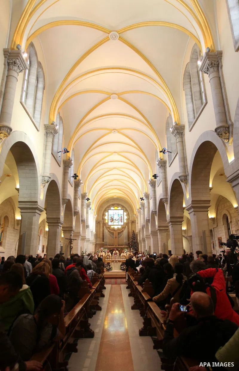 Fouad Twal, the Patriarch of the Holy Land, during a Christmas eve service following the procession from Manger Square, through the Church of the Nativity, where Christians believe the Virgin Mary gave birth to Jesus Chr...
