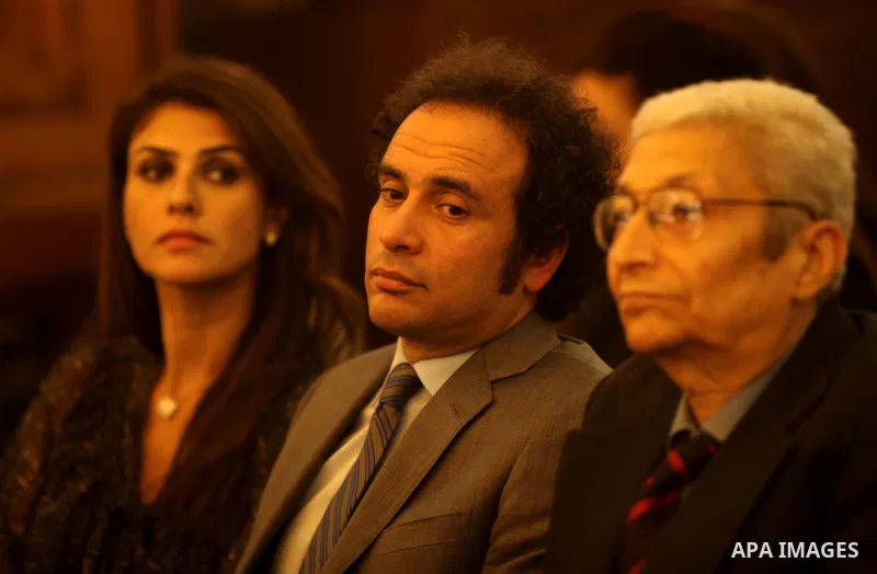 Egyptian National Rescue Front member Amr Hamzawy attends Christmas mass in Cairo, on December 24, 2012. Photo by Ashraf Amra
