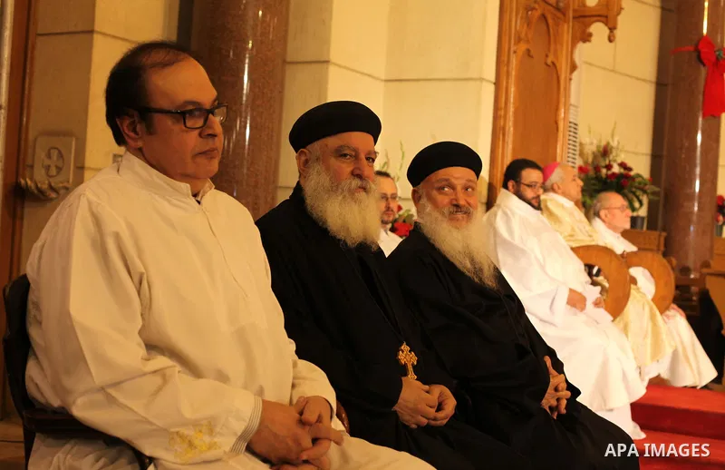 Christians attend Christmas mass in Cairo, on December 24, 2012. Photo by Ashraf Amra