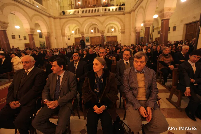 Christians attend Christmas mass in Cairo, on December 24, 2012. Photo by Ashraf Amra