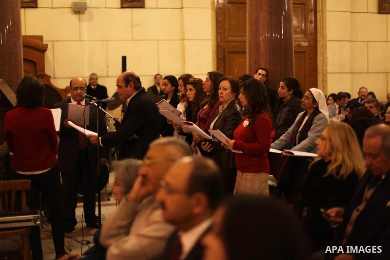 Christians attend Christmas mass in Cairo, on December 24, 2012. Photo by Ashraf Amra