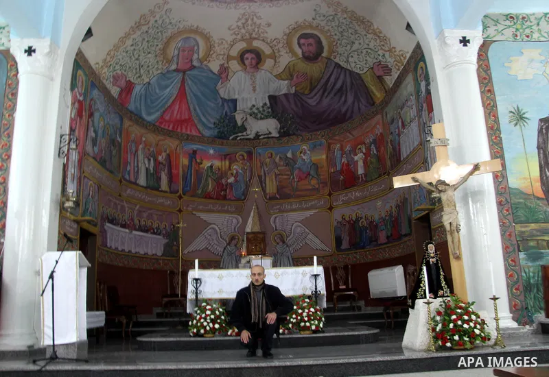 Palestinians Christian take part in the celebrations at a church of Deir Latin, during Christmas celebrations in Gaza city, on December 24, 2012. Photo by Ezz al-Zanoon