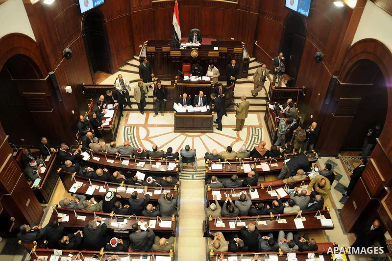 Members of the Egyptian Shura Council (Upper house of the parliament), attend the first meeting after approving the new constitution, in Cairo, Egypt, 26 December 2012. According to the new constitution, the Islamist-dom...