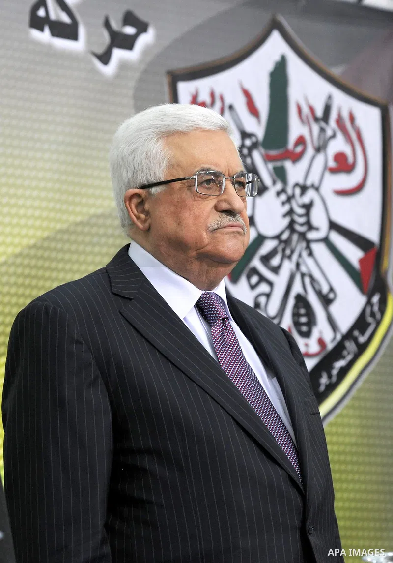Palestinian Authority President and head of the Fatah movement Mahmud Abbas attends a Fatah "Revolutionary Council" meeting in the Palestinian West Bank city of Ramallah along with top officials, on December 26, 2012. Ph...