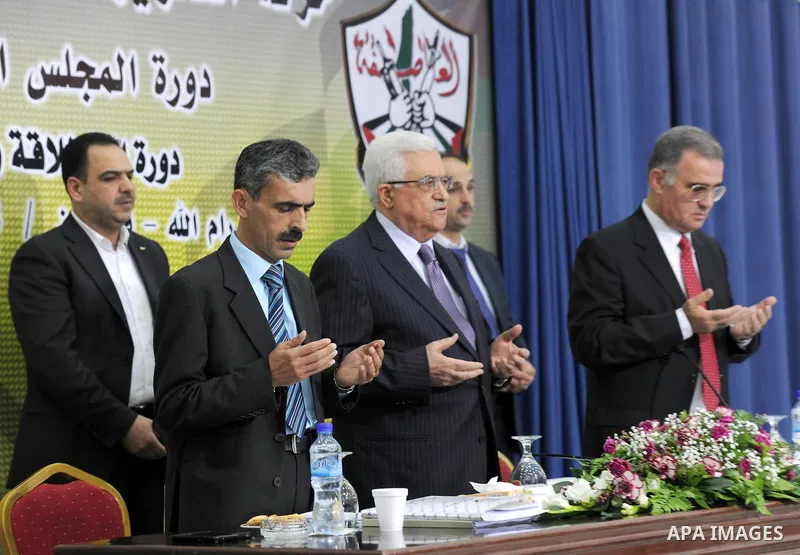 Palestinian Authority President and head of the Fatah movement Mahmud Abbas attends a Fatah "Revolutionary Council" meeting in the Palestinian West Bank city of Ramallah along with top officials, on December 26, 2012. Ph...