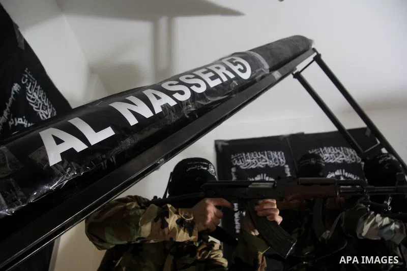 Militants of El-Naser Salah El-Deen brigades of the popular resistance, during they prefabricate a homemade rockets named (Al Naser 5) , marking the 4 th anniversary of the Israel-Gaza war, in Gaza City, on Dec. 27, 2012...