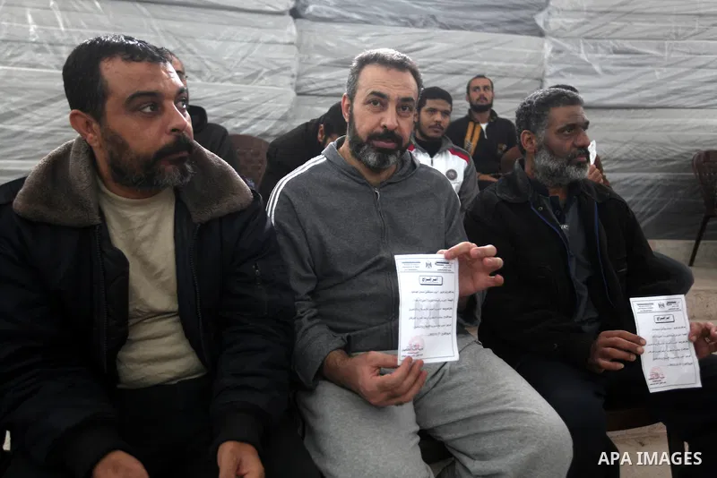 Palestinian prisoners gather before released from a Hamas-run jail in Gaza City on December 27, 2012. Hamas government has decided to pardon 26 prisoners six of them from the cases against Fatah members which are related...