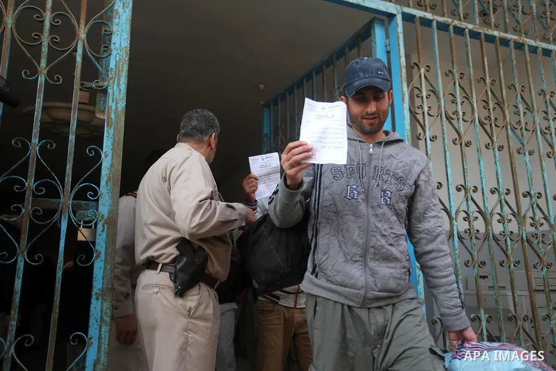 Palestinian prisoners out from a Hamas-run jail after released them in Gaza City on December 27, 2012. Hamas government has decided to pardon 26 prisoners six of them from the cases against Fatah members which are relate...
