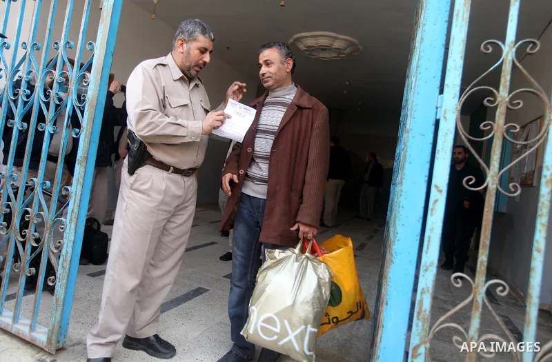 Palestinian prisoners out from a Hamas-run jail after released them in Gaza City on December 27, 2012. Hamas government has decided to pardon 26 prisoners six of them from the cases against Fatah members which are relate...