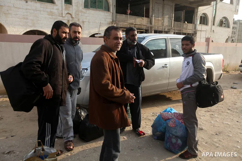 Palestinian prisoners out from a Hamas-run jail after released them in Gaza City on December 27, 2012. Hamas government has decided to pardon 26 prisoners six of them from the cases against Fatah members which are relate...