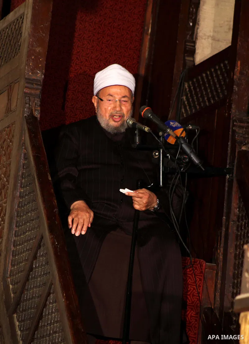 Egyptian cleric Sheikh Yusuf al-Qaradawi, chairman of the International Union of Muslim Scholars, leads Friday prayers before a protest against Syrian President Bashar al-Assad, at Al Azhar mosque in old Cairo December 2...