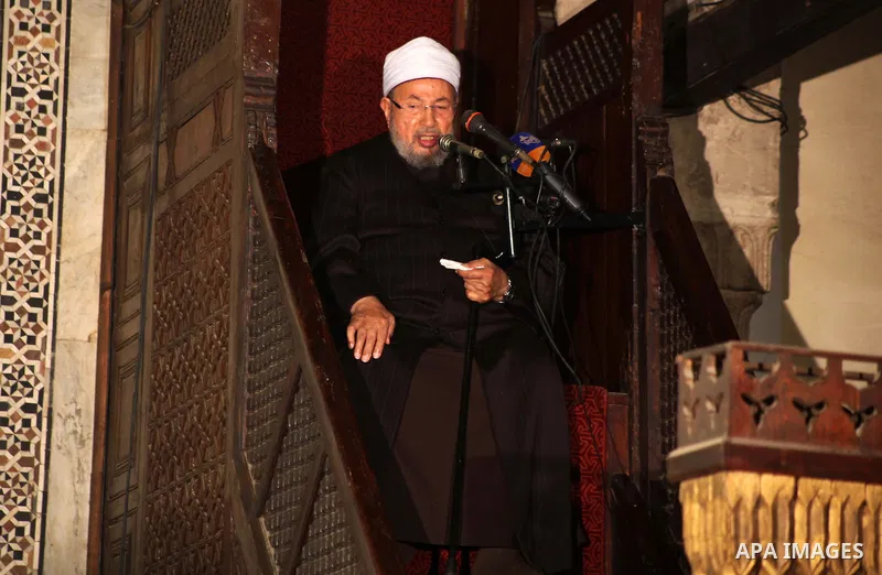 Egyptian cleric Sheikh Yusuf al-Qaradawi, chairman of the International Union of Muslim Scholars, leads Friday prayers before a protest against Syrian President Bashar al-Assad, at Al Azhar mosque in old Cairo December 2...