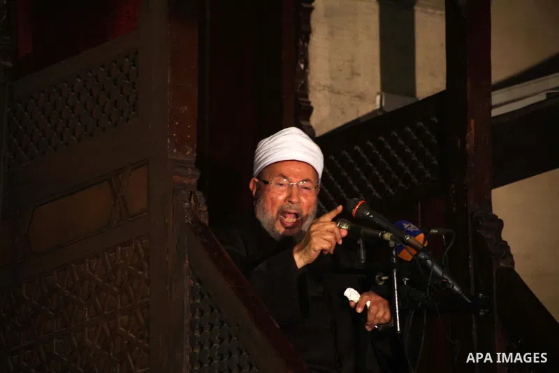 Egyptian cleric Sheikh Yusuf al-Qaradawi, chairman of the International Union of Muslim Scholars, leads Friday prayers before a protest against Syrian President Bashar al-Assad, at Al Azhar mosque in old Cairo December 2...