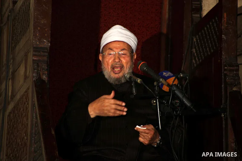 Egyptian cleric Sheikh Yusuf al-Qaradawi, chairman of the International Union of Muslim Scholars, leads Friday prayers before a protest against Syrian President Bashar al-Assad, at Al Azhar mosque in old Cairo December 2...