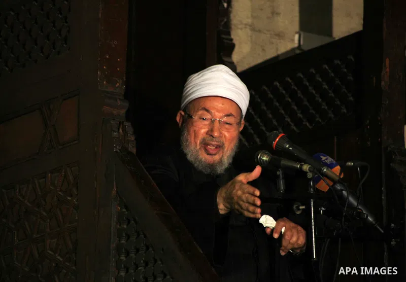 Egyptian cleric Sheikh Yusuf al-Qaradawi, chairman of the International Union of Muslim Scholars, leads Friday prayers before a protest against Syrian President Bashar al-Assad, at Al Azhar mosque in old Cairo December 2...