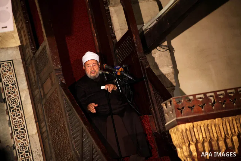 Egyptian cleric Sheikh Yusuf al-Qaradawi, chairman of the International Union of Muslim Scholars, leads Friday prayers before a protest against Syrian President Bashar al-Assad, at Al Azhar mosque in old Cairo December 2...