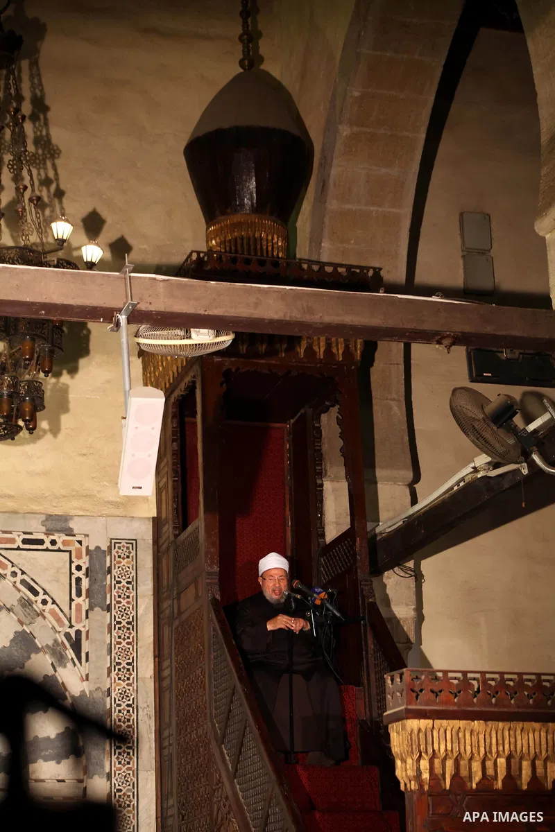Egyptian cleric Sheikh Yusuf al-Qaradawi, chairman of the International Union of Muslim Scholars, leads Friday prayers before a protest against Syrian President Bashar al-Assad, at Al Azhar mosque in old Cairo December 2...