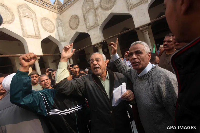 Egyptian protestors gather during a rally in support of the Syrian people and against Syria's President Bashar al-Assad at Al-Azhar mosque in Cairo, on December 28, 2012. Syrian warplanes launched air raids in Damascus p...