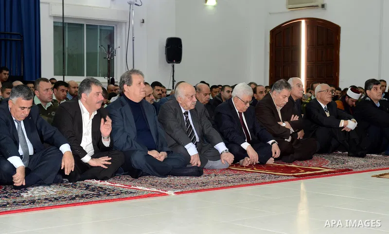 Palestinian President Mahmoud Abbas (Abu Mazen) prays Friday prayers in the West bank city of Ramallah, on Dec. 28, 2012. Photo by Thaer Ganaim