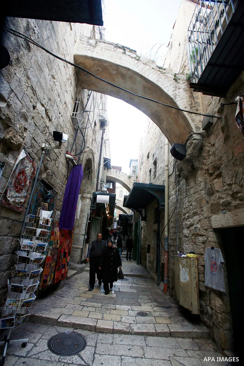 Palestinians shop at the market in Jerusalem's old city on December 29, 2012. Photo by Mahfouz Abu Turk