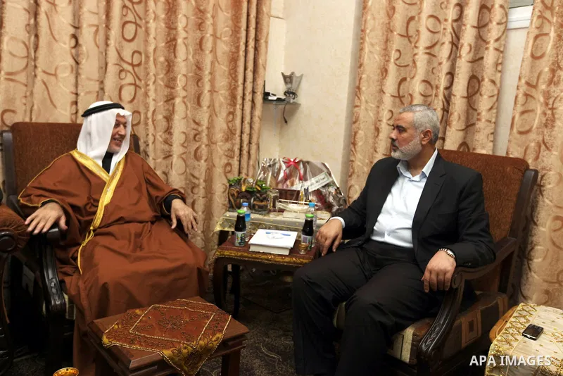 Palestinian Prime Minister Ismail Haniyeh in Gaza strip, meets with former Minister of Awqaf and preacher of Al-Aqsa Mosque, Sheikh Yusuf Salameh in Gaza city on December 29, 2012. Photo by Mohammed Al-Ostaz