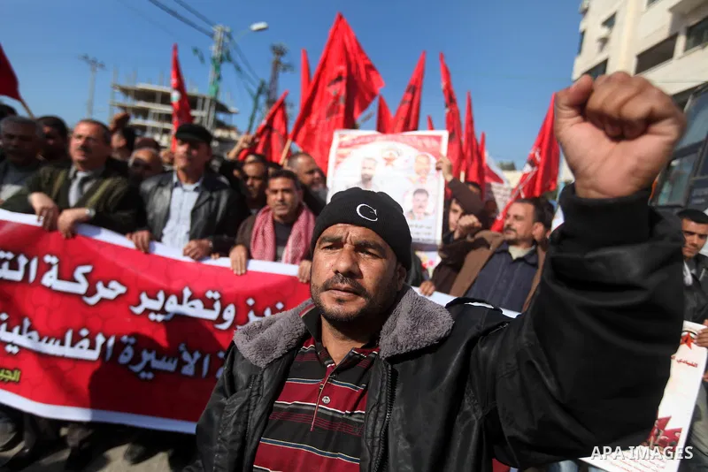 Palestinian demonstrators take part in a protest calling for the release of Palestinian prisoners from Israeli jails in Gaza city, December 30, 2012. Photo by Majdi Fathi