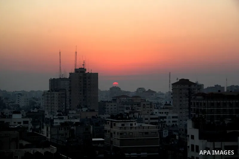A Photo shows the last sunset of 2012 over Gaza city, Monday, Dec. 31, 2012. Photo by Ezz al-Zanoon