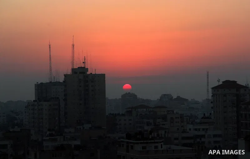 A Photo shows the last sunset of 2012 over Gaza city, Monday, Dec. 31, 2012. Photo by Ezz al-Zanoon