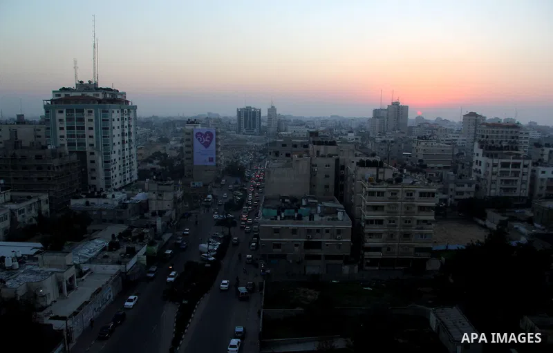 A Photo shows the last sunset of 2012 over Gaza city, Monday, Dec. 31, 2012. Photo by Ezz al-Zanoon