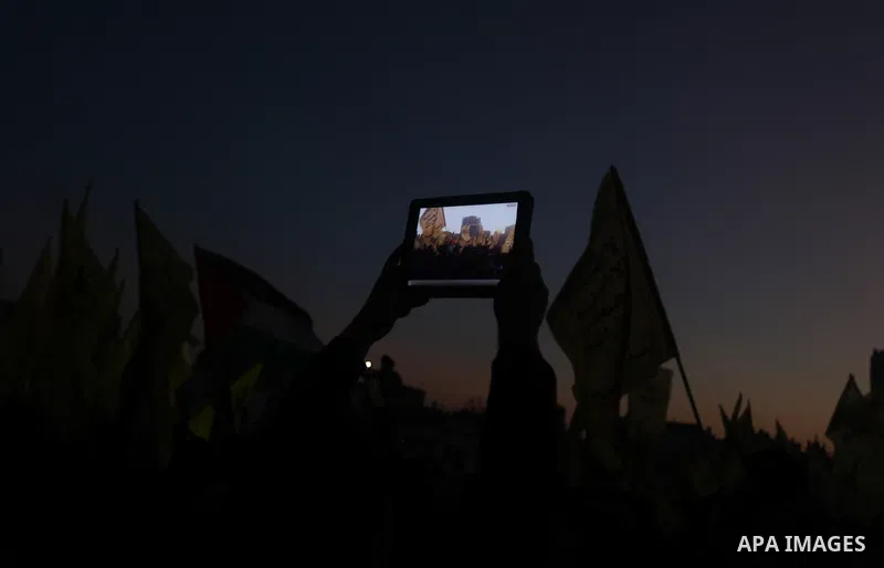 Palestinian supporters of Fatah movement hold the party's flags during a rally in Gaza city on December 31, 2012. The Gaza branch of Palestinian president Mahmud Abbas's Fatah party said on Friday it will mark its annive...