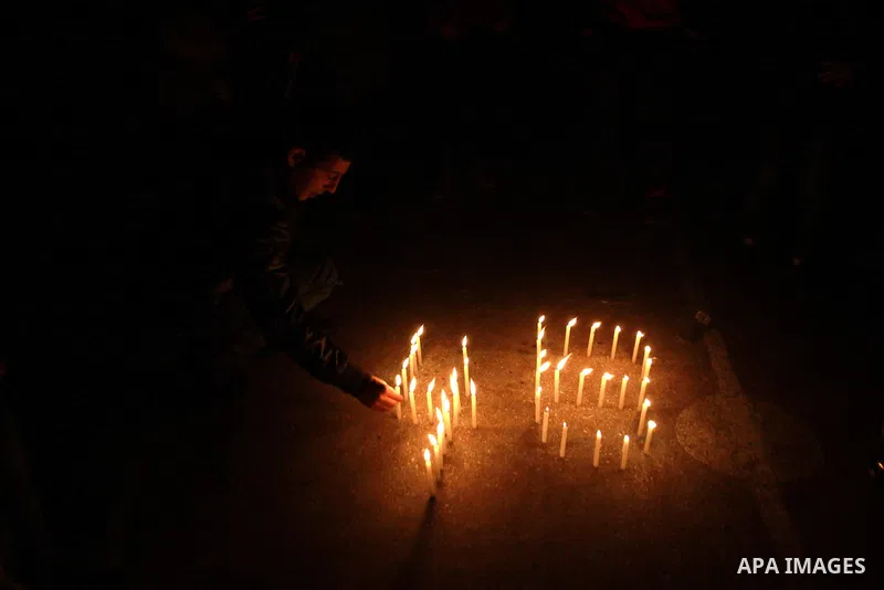 Palestinian supporters of Fatah movement place candles during a rally on the eve of the 48th anniversary of the formation on the Fatah movement, on December 31, 2012, in the West Bank city of Nablus. The Fatah anniversar...