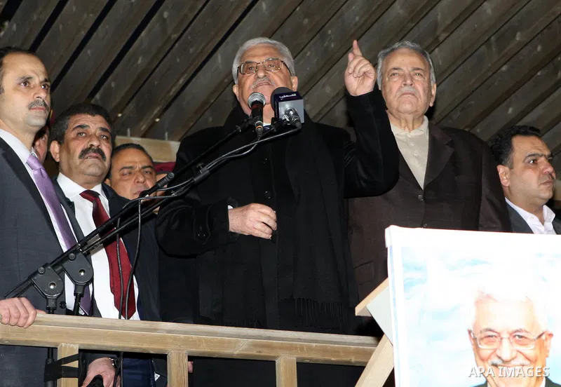 Palestinian President Mahmud Abbas speaks as thousands of Palestinians look on, on the eve of the 48th anniversary of the formation on the Fatah movement, on December 31, 2012, in the West Bank city of Ramallah. The Fata...