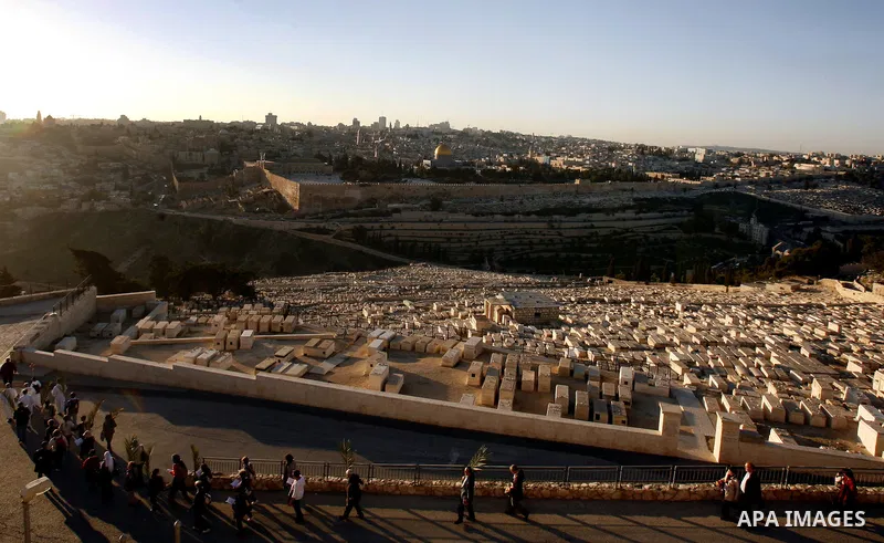 Foreign tourists walk visit the Jerusalem's old city on December 31, 2012. Photo by Mahfouz Abu Turk
