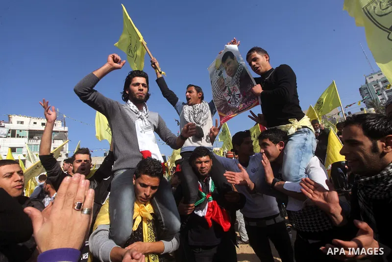 Palestinian Fatah supporters take part in a rally marking the 48th anniversary of the founding of the Fatah movement, in Gaza City January 4, 2013. Fatah held its anniversary rally for the first time since 2007 in Gaza S...
