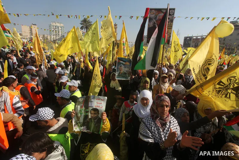 Palestinians take part in a rally marking the 48th anniversary of the founding of the Fatah movement, in Gaza City January 4, 2013. Hundreds of thousands of Palestinians joined a rare rally staged by President Mahmoud Ab...