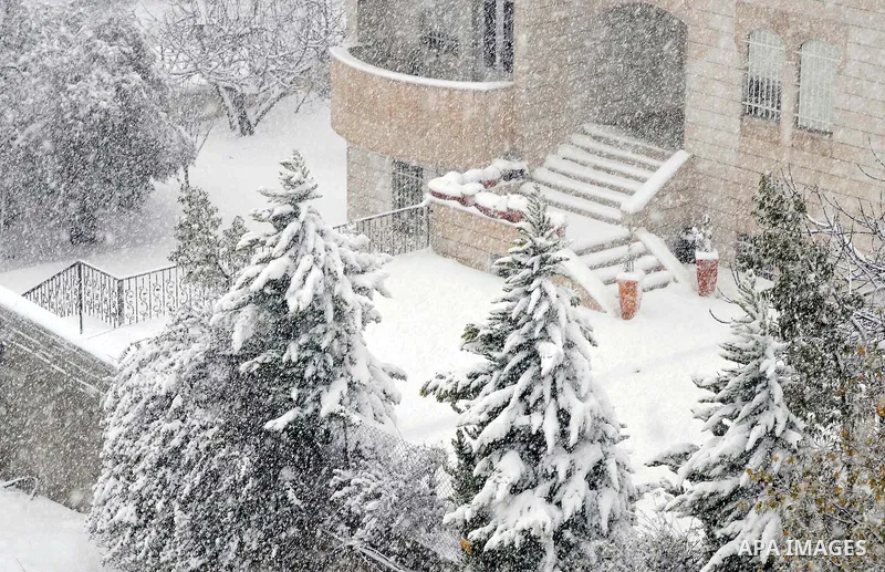 A general view shows the snow in the West Bank city of Hebron, as wintry weather swept through the region 10 January 2013. Photo by Mamoun Wazwaz