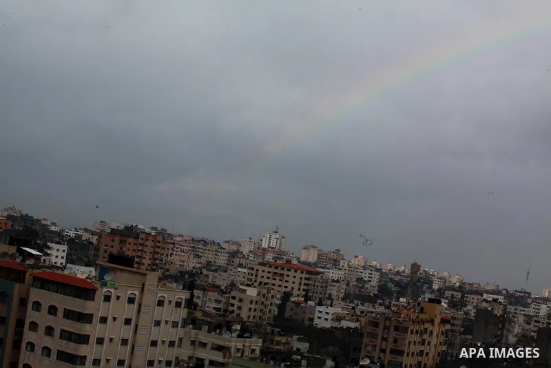 A rainbow is seen over Gaza city on a windy winter day on January 10, 2013. Photo by Ashraf Amra