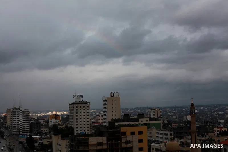 A rainbow is seen over Gaza city on a windy winter day on January 10, 2013. Photo by Ashraf Amra
