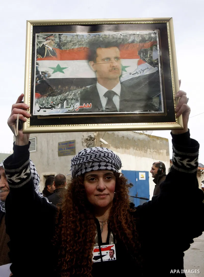 Israeli Arabs and Palestinians protest against US and Israel during a demonstration in support for the Syrian President Bashar al-Assad in west Jerusalem on January 12, 2013. Photo by Mahfouz Abu Turk