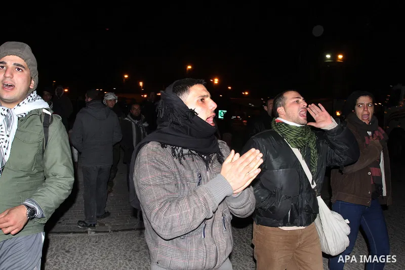 Palestinians celebrate after the Israeli border police released Palestinian protesters from a 'tent city outpost' called Bab al-Shams (Gate of the Sun), errected outside the Palestinian village of Ez Za'im in the an disp...