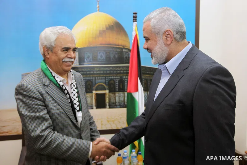 Palestinian Prime Minister in Gaza strip Ismail Haniyeh meets with an international human rights delegation in Gaza city on 14 January 2013. Photo by Ahmed Shaat