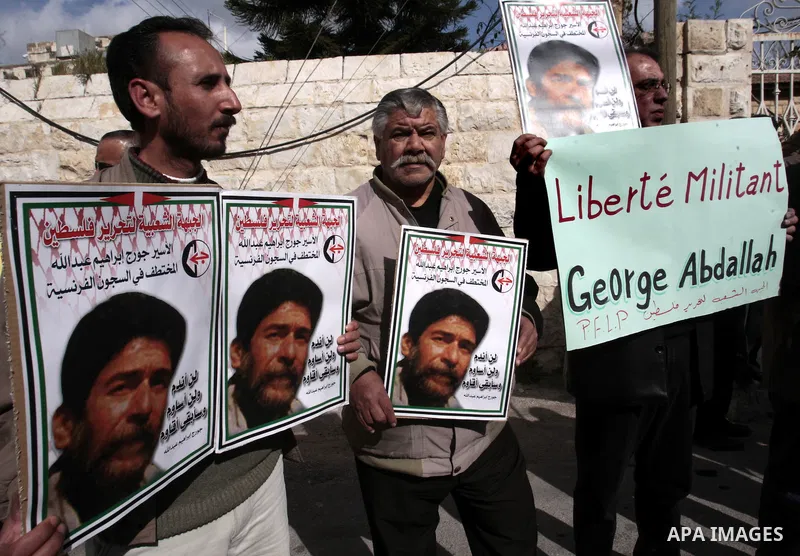 Palestinian supporters of the Popular Front for the Liberation of Palestine (PFLP) take part in a protest outside the French Cultural Center calling for the release of Lebanese militant Georges Ibrahim Abdallah and Ahmed...