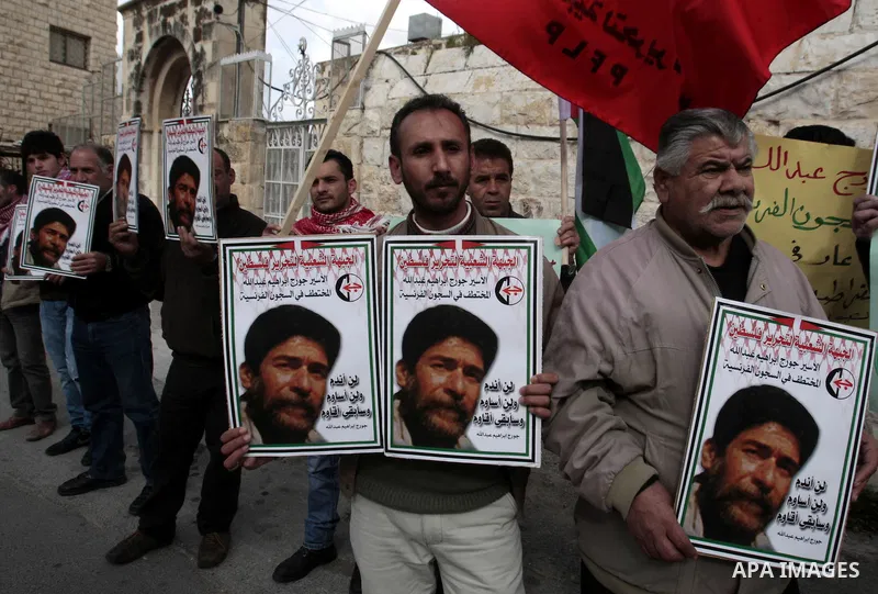 Palestinian supporters of the Popular Front for the Liberation of Palestine (PFLP) take part in a protest outside the French Cultural Center calling for the release of Lebanese militant Georges Ibrahim Abdallah and Ahmed...