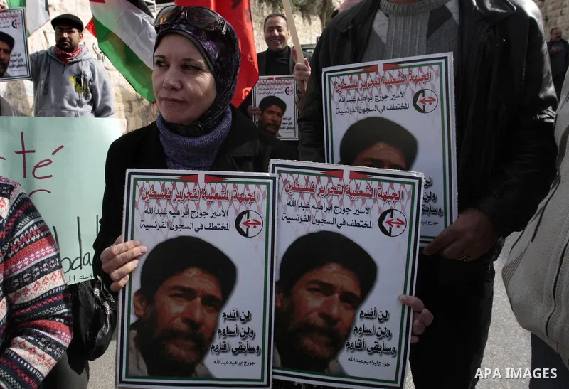 Palestinian supporters of the Popular Front for the Liberation of Palestine (PFLP) take part in a protest outside the French Cultural Center calling for the release of Lebanese militant Georges Ibrahim Abdallah and Ahmed...