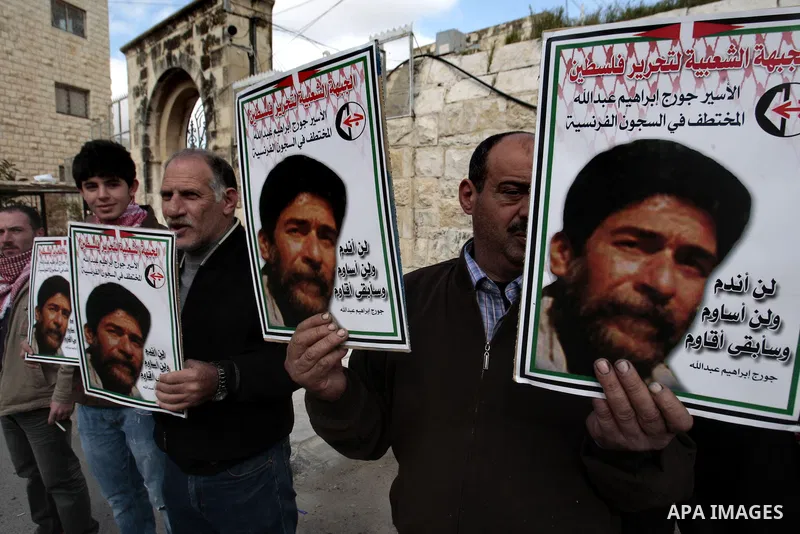 Palestinian supporters of the Popular Front for the Liberation of Palestine (PFLP) take part in a protest outside the French Cultural Center calling for the release of Lebanese militant Georges Ibrahim Abdallah and Ahmed...