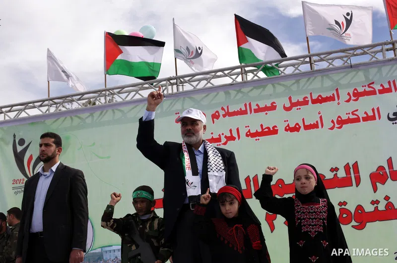 Palestinian Prime Minister in Gaza Strip, Ismail Haniya participate in the graduation ceremony for martial arts course organized by Palestinian ministry of education in Gaza City January 24, 2013. Photo by Ashraf Amra