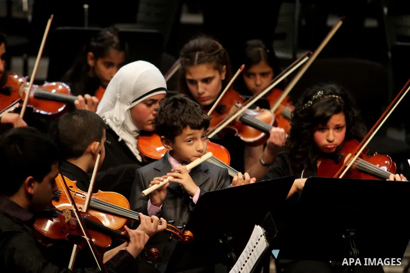 Jerusalem Youth Orchestra perform a concert in the West Bank city of Ramallah, on Jan. 27, 2013. Photo by Issam Rimawi