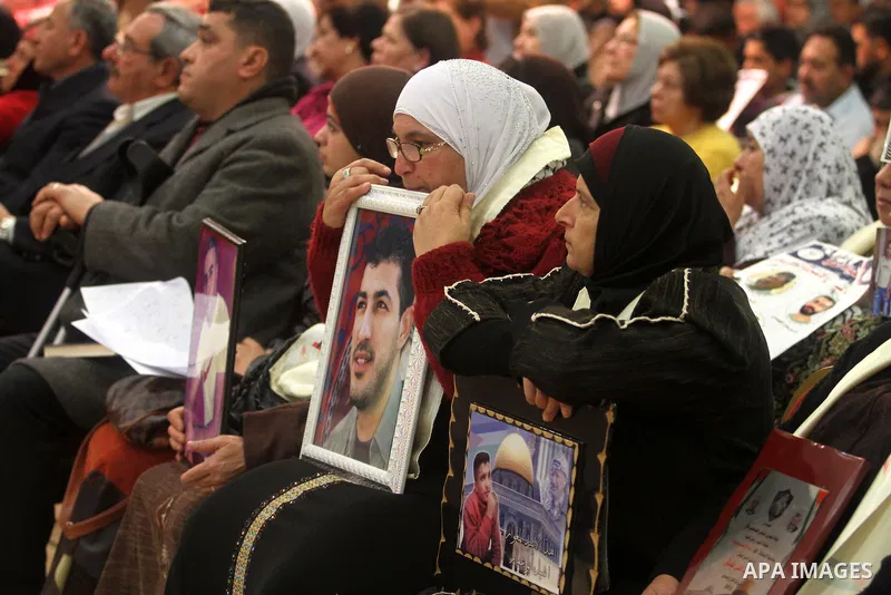 Palestinians participate the popular conference meeting to support Palestinian prisoners in the Israeli jails, in the Red Crescent headquarter in the West Bank city of Ramallah on January 28, 2013. Photo by Issam Rimawi