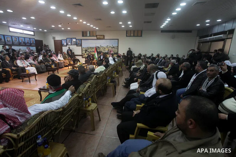 Palestinian Prime Minister in Gaza Ismail Haniyeh meets with the members of "Miles of Smiles 19" aid convoy in his office in Gaza City, on Feb. 04, 2013. Photo by Ashraf Amra