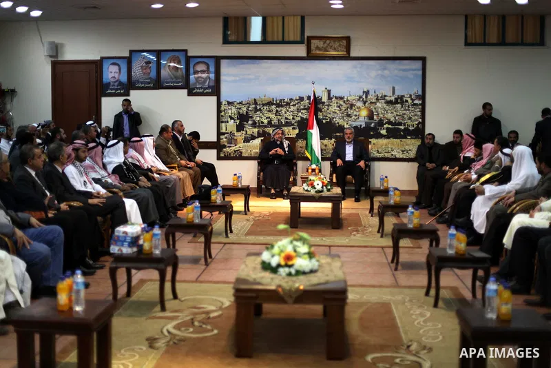 Palestinian Prime Minister in Gaza Ismail Haniyeh meets with the members of "Miles of Smiles 19" aid convoy in his office in Gaza City, on Feb. 04, 2013. Photo by Ashraf Amra